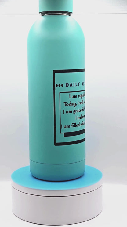 17 oz water bottle with positive affirmation to start your day.